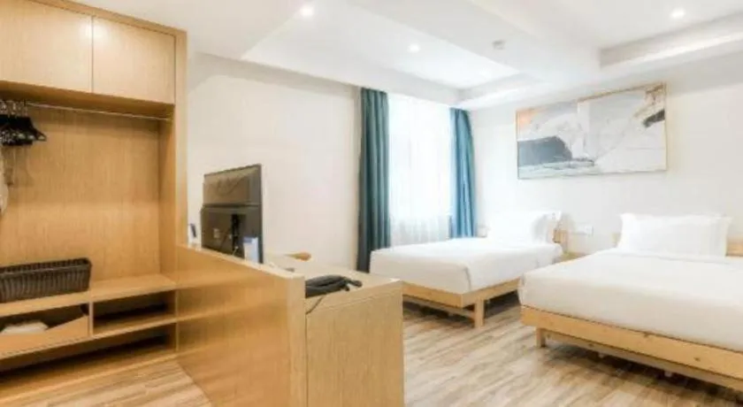 Bed in ZMAX Hotels Wuhan East Lake