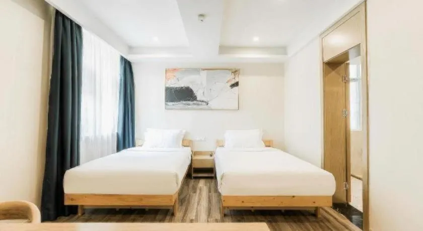 Bed in ZMAX Hotels Wuhan East Lake