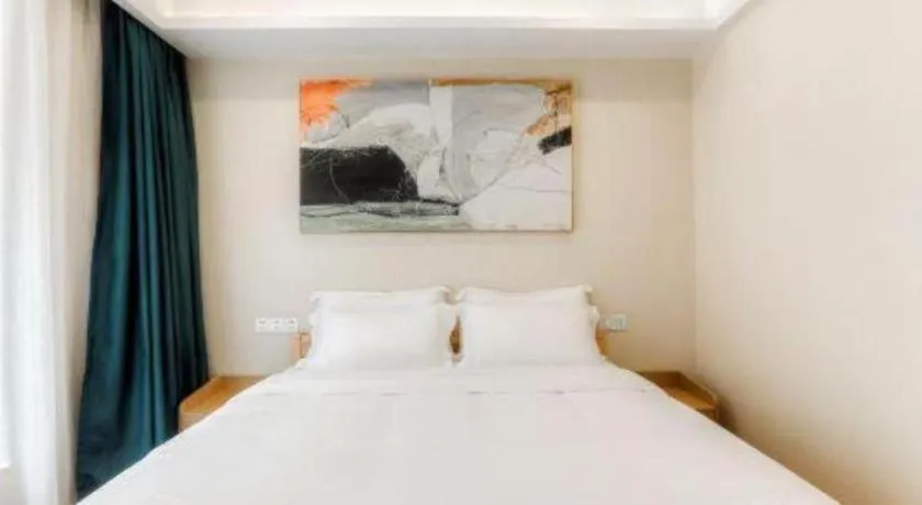 Bed in ZMAX Hotels Wuhan East Lake