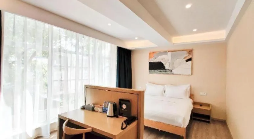 Bed in ZMAX Hotels Wuhan East Lake