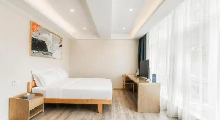 Bed in ZMAX Hotels Wuhan East Lake