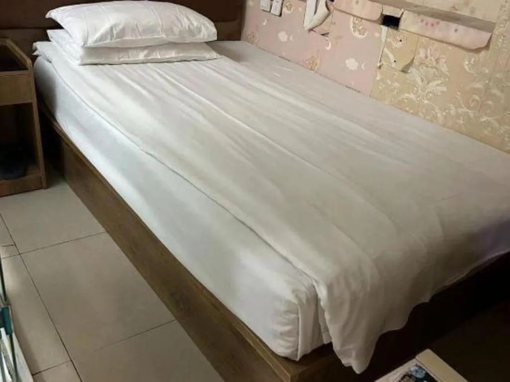 Bed in PAI Hotels Beijing Tongzhou Majuqiao