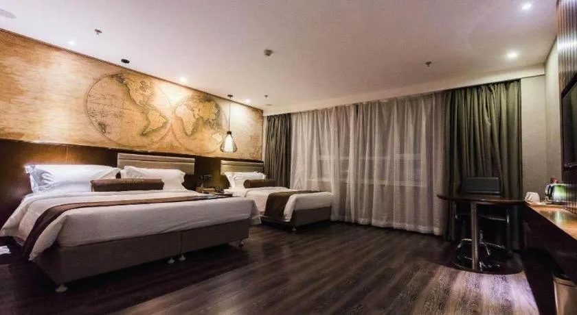 Bed in James Joyce Coffetel Jilin Railway Station Fortune Plaza