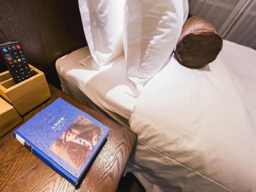 Bed in James Joyce Coffetel Jilin Railway Station Fortune Plaza