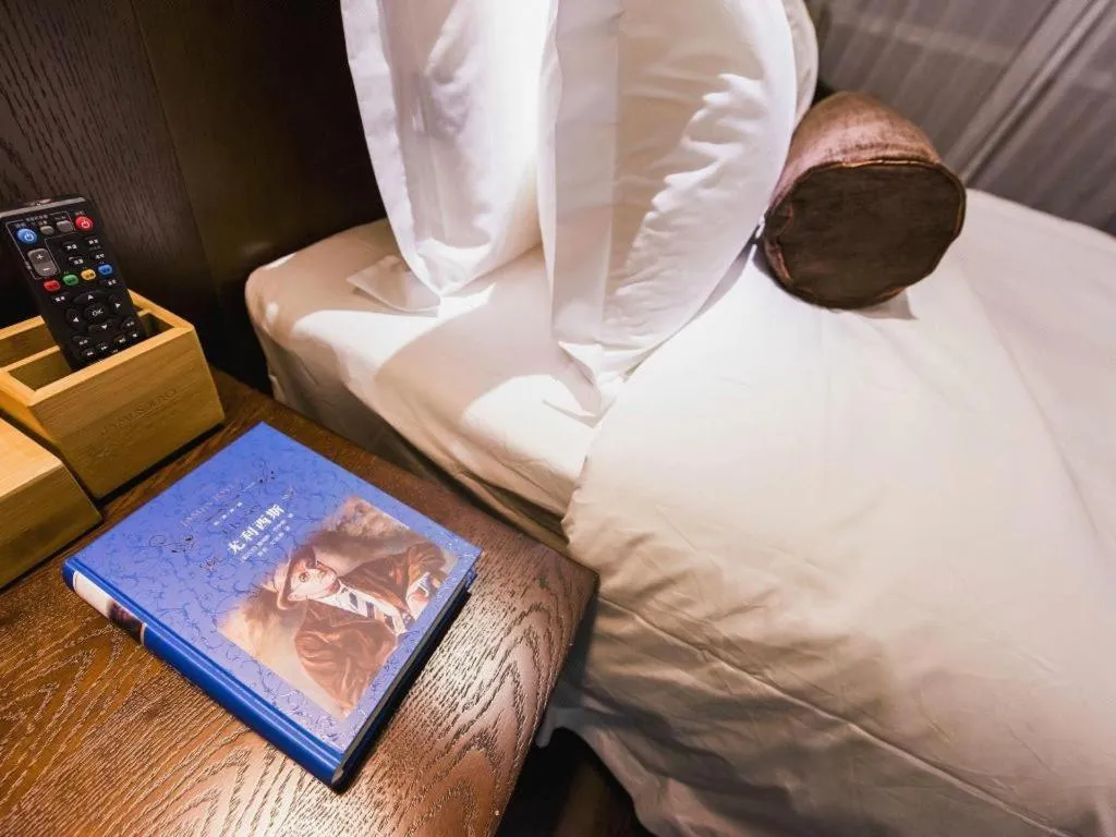 Bed in James Joyce Coffetel Jilin Railway Station Fortune Plaza