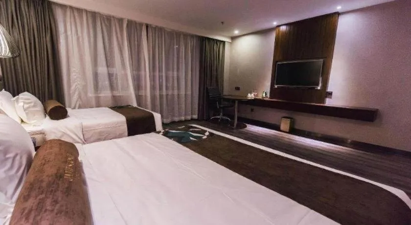 Bed in James Joyce Coffetel Jilin Railway Station Fortune Plaza