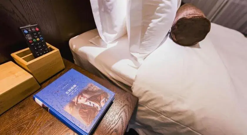 Bed in James Joyce Coffetel Jilin Railway Station Fortune Plaza Bed in James Joyce Coffetel Jilin Railway Station Fortune Plaza