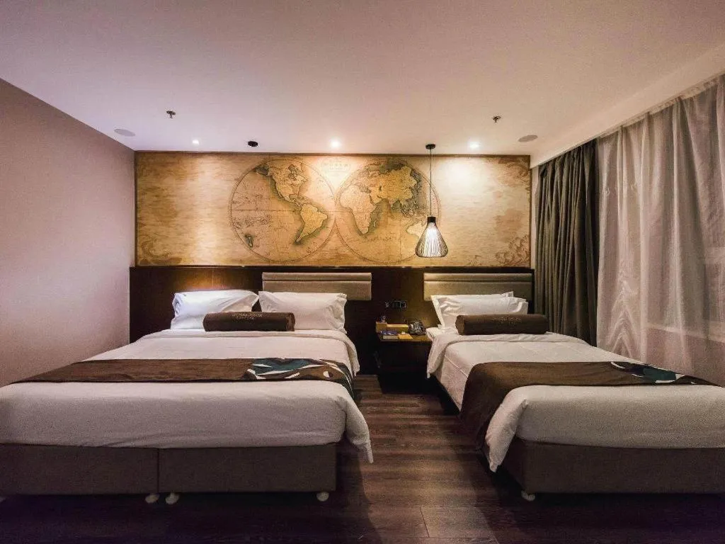 Bed in James Joyce Coffetel Jilin Railway Station Fortune Plaza