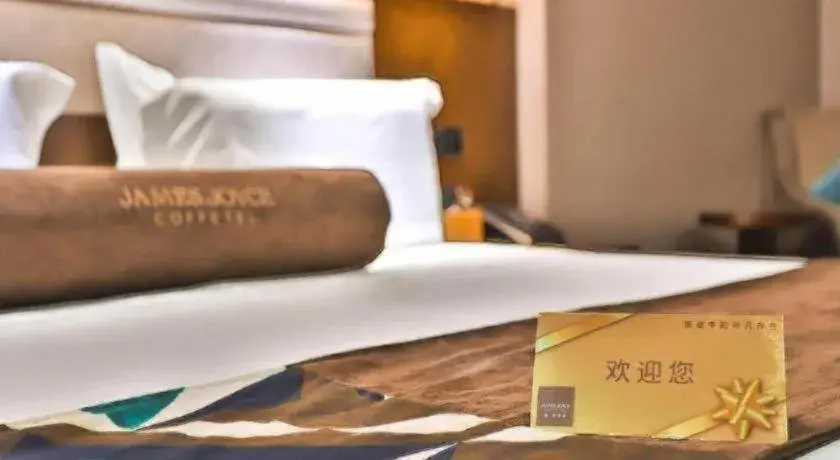 Bed in James Joyce Coffetel Jilin Railway Station Fortune Plaza Bed in James Joyce Coffetel Jilin Railway Station Fortune Plaza