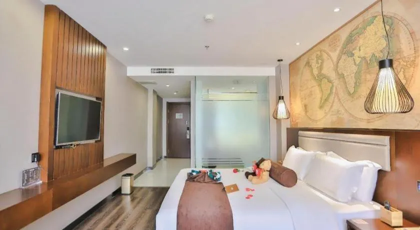 Bed in James Joyce Coffetel Jilin Railway Station Fortune Plaza