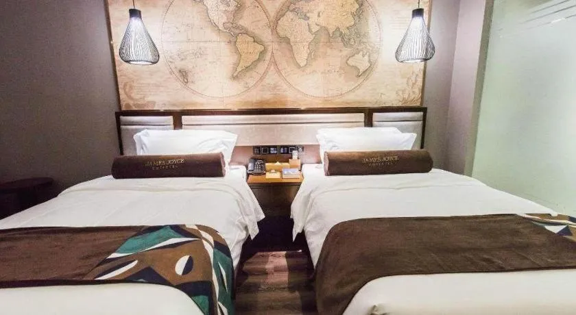 Bed in James Joyce Coffetel Jilin Railway Station Fortune Plaza