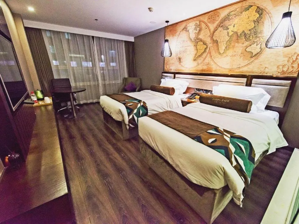 Bed in James Joyce Coffetel Jilin Railway Station Fortune Plaza