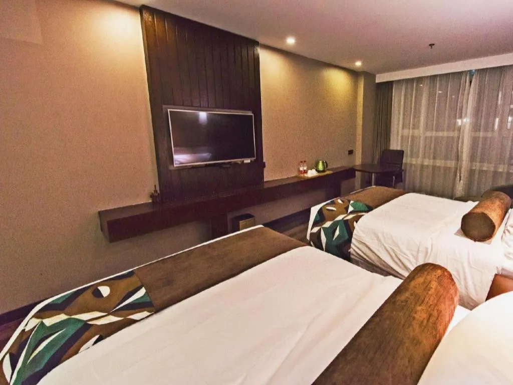 Bed in James Joyce Coffetel Jilin Railway Station Fortune Plaza