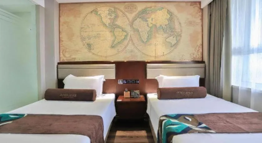 Bed in James Joyce Coffetel Jilin Railway Station Fortune Plaza