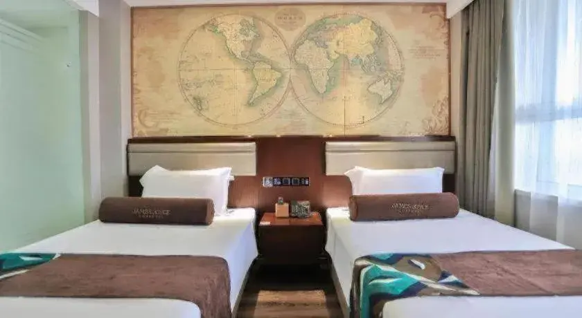 Bed in James Joyce Coffetel Jilin Railway Station Fortune Plaza Bed in James Joyce Coffetel Jilin Railway Station Fortune Plaza