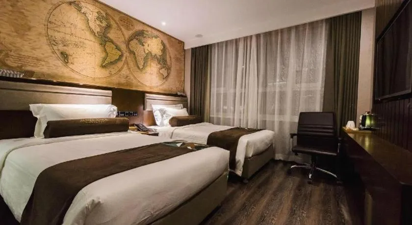 Bed in James Joyce Coffetel Jilin Railway Station Fortune Plaza