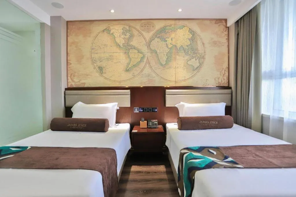 Bed in James Joyce Coffetel Jilin Railway Station Fortune Plaza