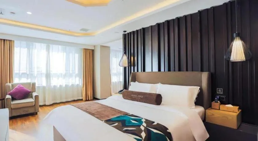 Bed in James Joyce Coffetel Jilin Railway Station Fortune Plaza