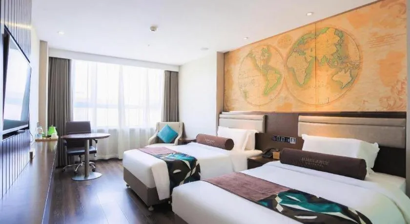 Bed in James Joyce Coffetel Jilin Railway Station Fortune Plaza