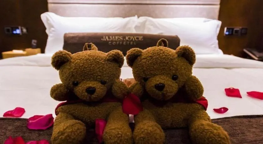 Bed in James Joyce Coffetel Jilin Railway Station Fortune Plaza