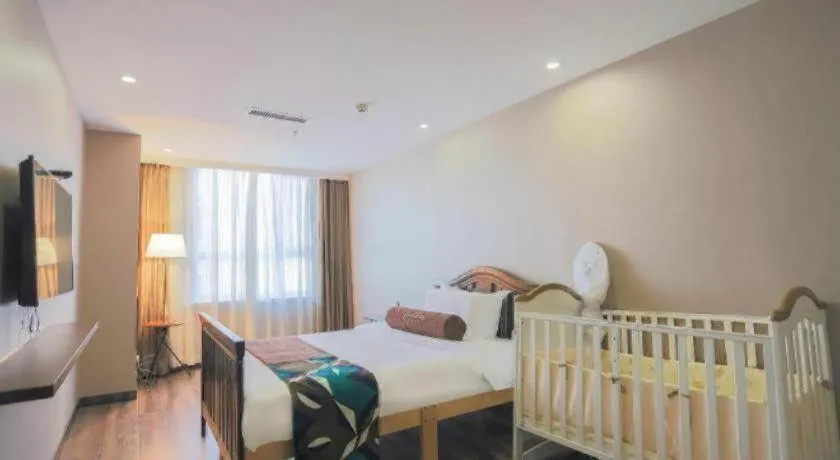 Bed in James Joyce Coffetel Jilin Railway Station Fortune Plaza