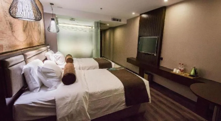 Bed in James Joyce Coffetel Jilin Railway Station Fortune Plaza