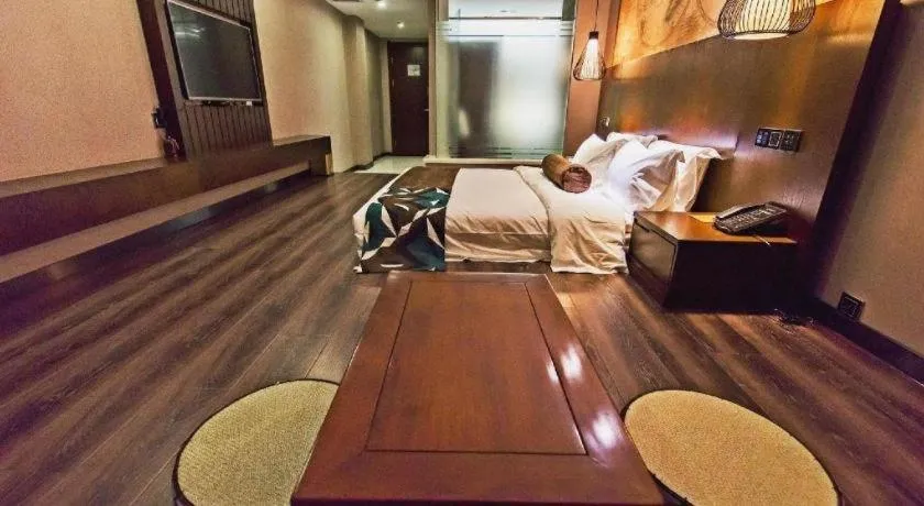 Bed in James Joyce Coffetel Jilin Railway Station Fortune Plaza