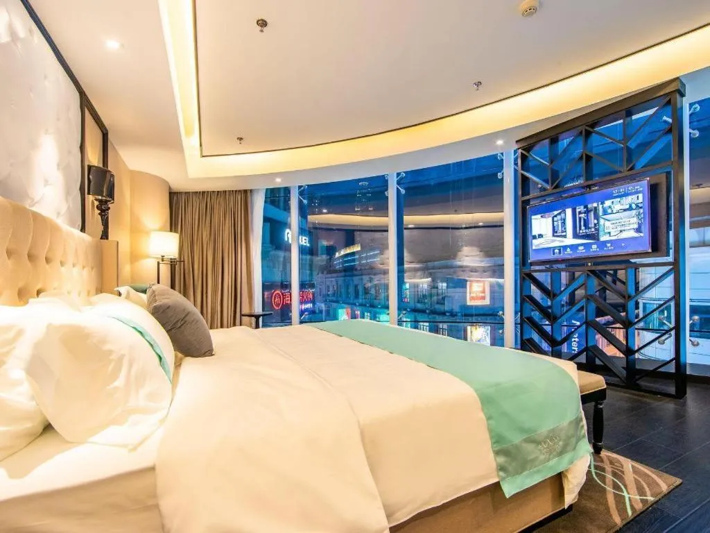 Bed in Xana Hotelle Tianjin Binjiang Road Heping Road Metro Station Quanyechang