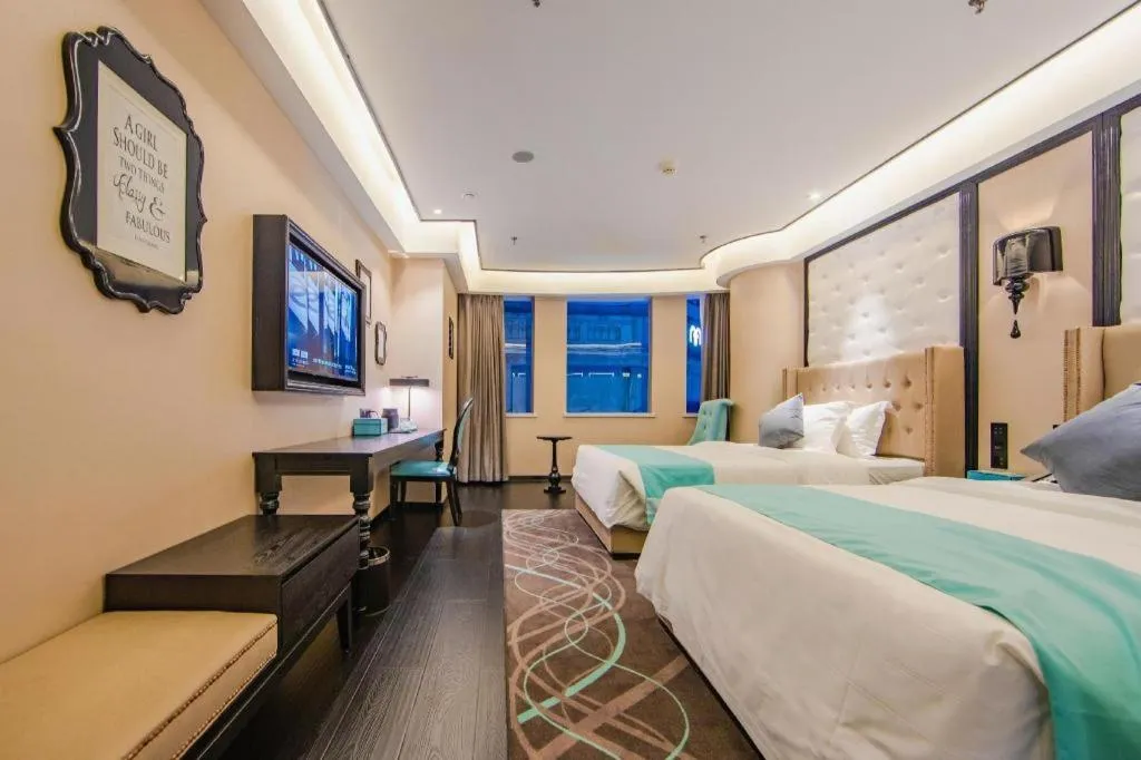 Bed in Xana Hotelle Tianjin Binjiang Road Heping Road Metro Station Quanyechang
