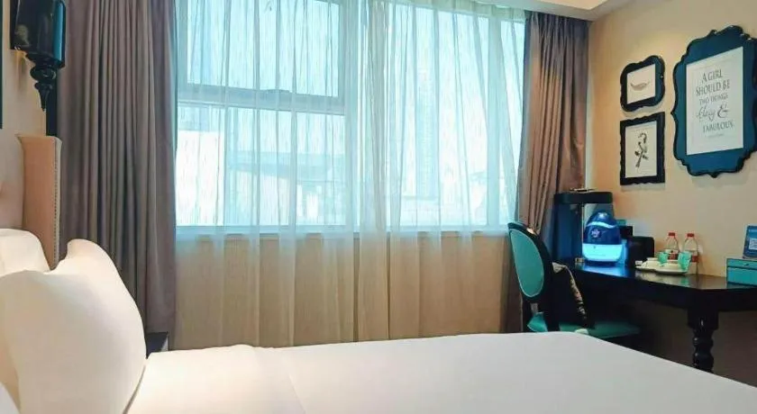 Bed in Xana Hotelle Tianjin Binjiang Road Heping Road Metro Station Quanyechang