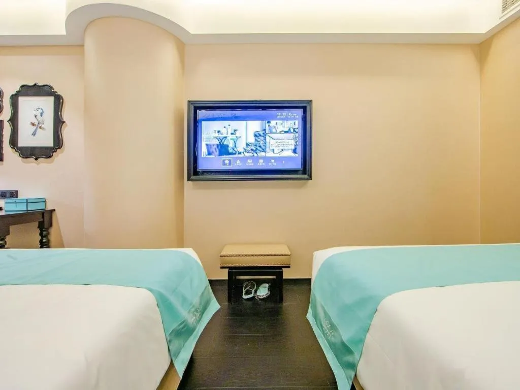 Bed in Xana Hotelle Tianjin Binjiang Road Heping Road Metro Station Quanyechang