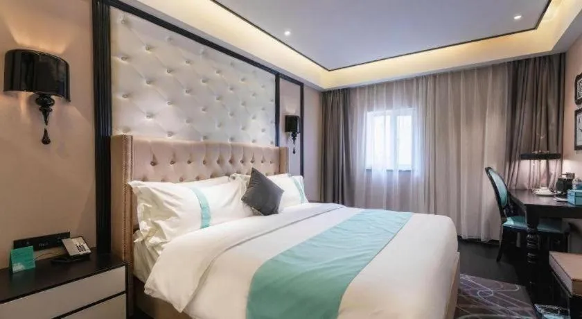 Bed in Xana Hotelle Tianjin Binjiang Road Heping Road Metro Station Quanyechang