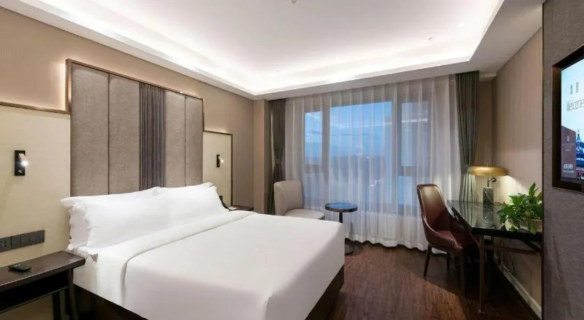 Bed in James Joyce Coffetel Harbin West High-speed Railway Station Wanda Plaza