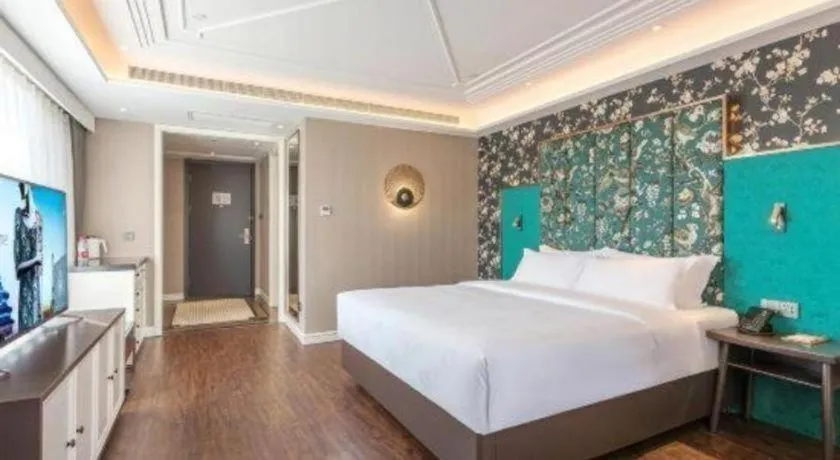 Bed in James Joyce Coffetel Harbin West High-speed Railway Station Wanda Plaza