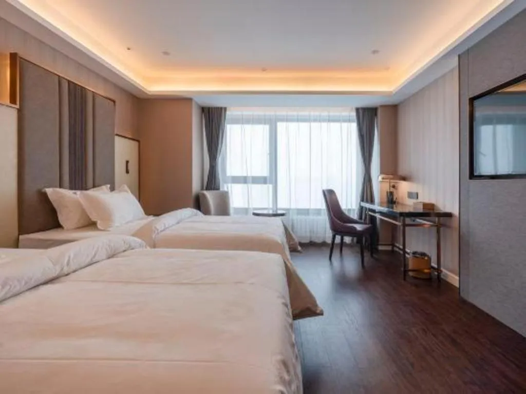 Bed in James Joyce Coffetel Harbin West High-speed Railway Station Wanda Plaza