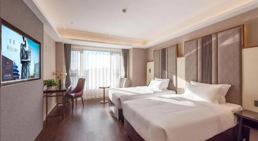 Bed in James Joyce Coffetel Harbin West High-speed Railway Station Wanda Plaza