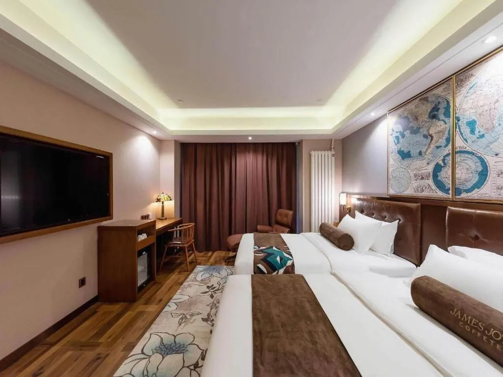 Bed in James Joyce Coffetel Harbin West High-speed Railway Station Wanda Plaza