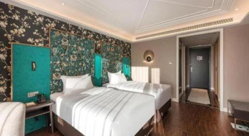 Bed in James Joyce Coffetel Harbin West High-speed Railway Station Wanda Plaza