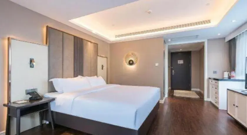 Bed in James Joyce Coffetel Harbin West High-speed Railway Station Wanda Plaza Bed in James Joyce Coffetel Harbin West High-speed Railway Station Wanda Plaza