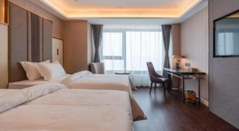 Bed in James Joyce Coffetel Harbin West High-speed Railway Station Wanda Plaza