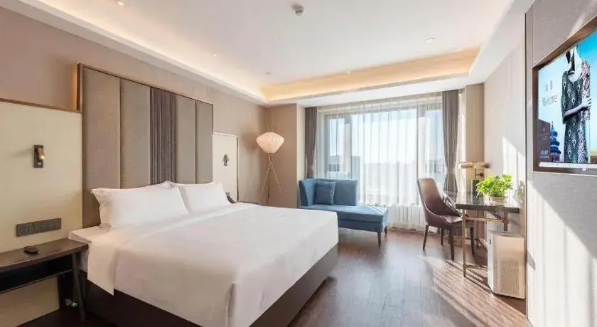 Bed in James Joyce Coffetel Harbin West High-speed Railway Station Wanda Plaza Bed in James Joyce Coffetel Harbin West High-speed Railway Station Wanda Plaza