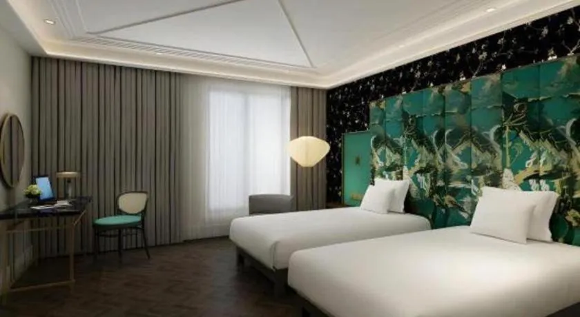 Bed in James Joyce Coffetel Harbin West High-speed Railway Station Wanda Plaza