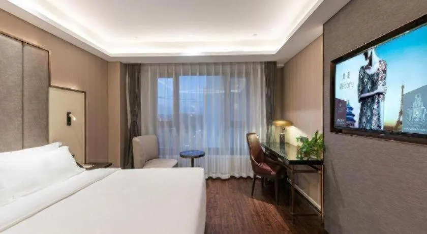 Bed in James Joyce Coffetel Harbin West High-speed Railway Station Wanda Plaza