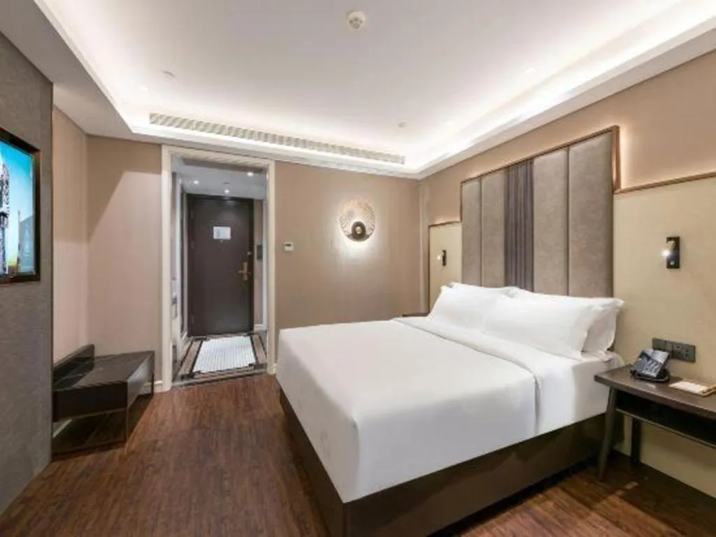 Bed in James Joyce Coffetel Harbin West High-speed Railway Station Wanda Plaza