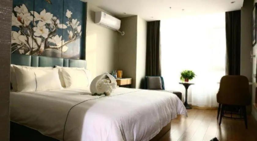 Bed in Magnotel Hengshui Lake Jizhou Middle School