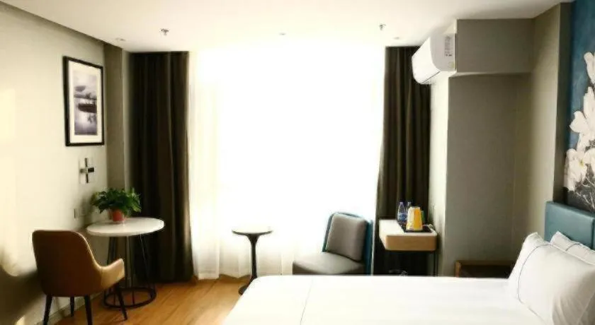 Bed in Magnotel Hengshui Lake Jizhou Middle School