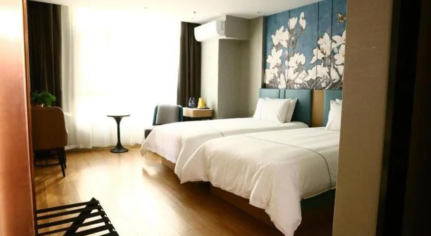 Bed in Magnotel Hengshui Lake Jizhou Middle School