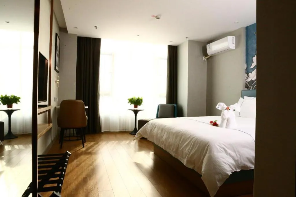 Bed in Magnotel Hengshui Lake Jizhou Middle School