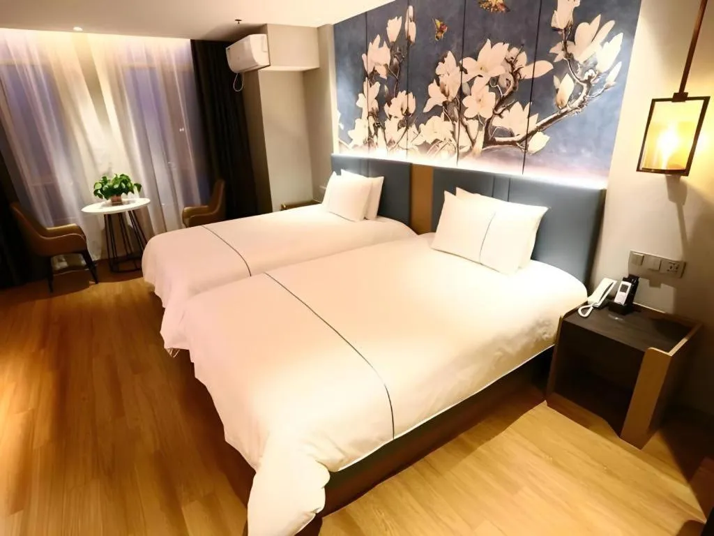 Bed in Magnotel Hengshui Lake Jizhou Middle School