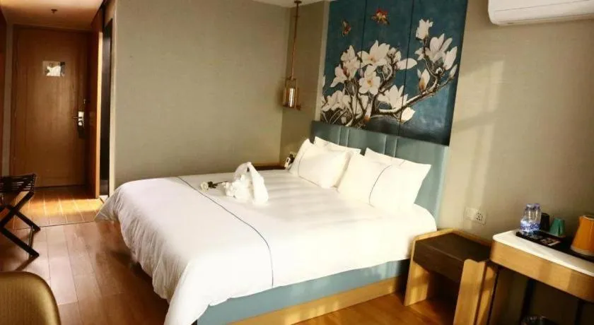 Bed in Magnotel Hengshui Lake Jizhou Middle School